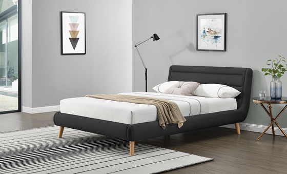 Un cadre de lit rembourrée avec une forme et un design uniques conviendra à votre style de décoration.