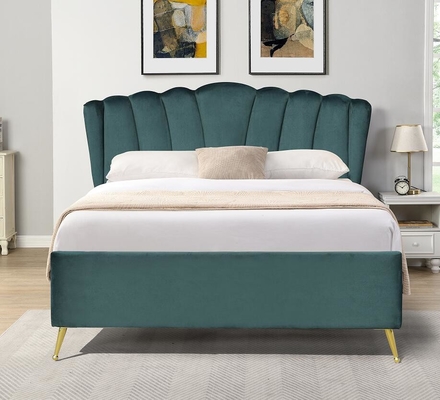 Lit de stockage en velours bleu avec quatre pieds d'or