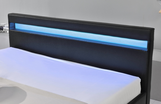 Le lit tapissé à LED a des lumières LED pour vous aider à dormir et contient quatre tiroirs de rangement